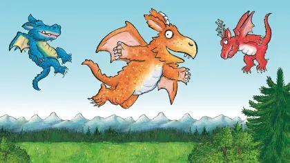 A group of colourful dragons learning to fly above some grass