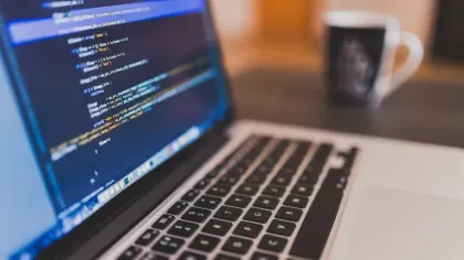 Computer showing lines of code on the screen