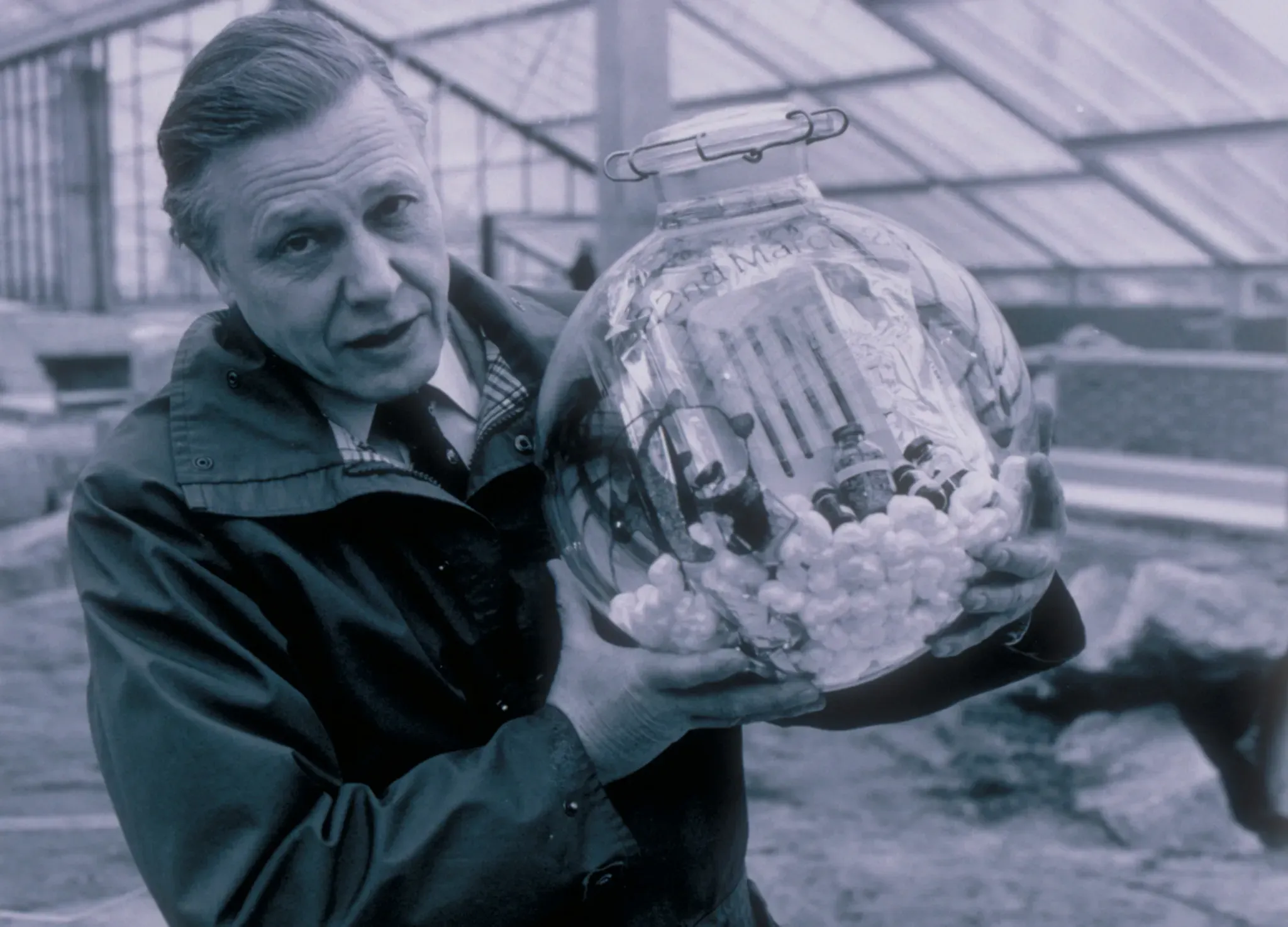David Attenborough, Princess of Wales Conservatory David Attenborough holding a time capsule before it was buried in the foundations of the Princess of Wales Conservatory