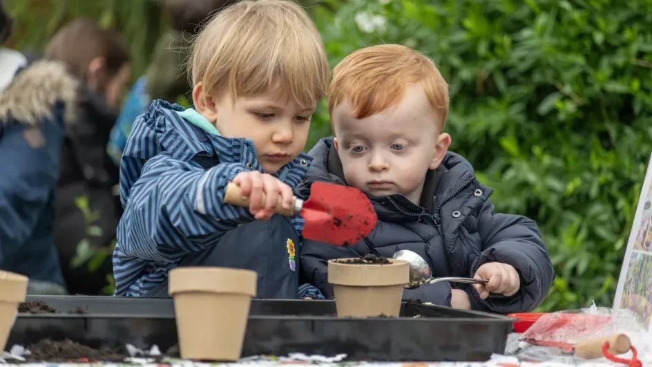 Children planting seeds