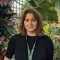 Kew researcher Lizzie Bell in a Kew glasshouse