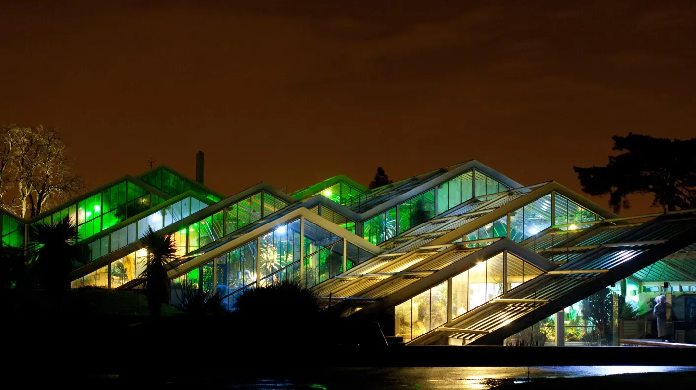 Princess of Wales Conservatory illuminated at night